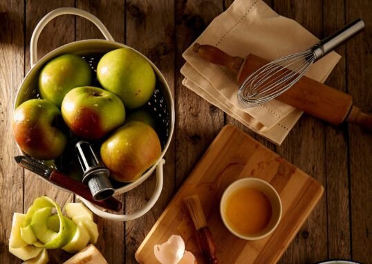 flat lay photography of mug on brown wooden chopping board